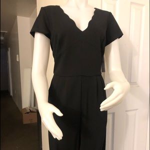 All black elegant jumpsuit .